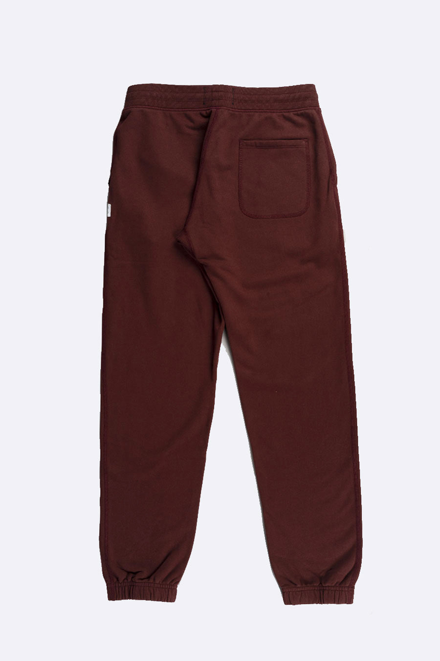 REIGNING CHAMP KNIT MIDWEIGHT TERRY CUFFED SWEATPANT CRIMSON